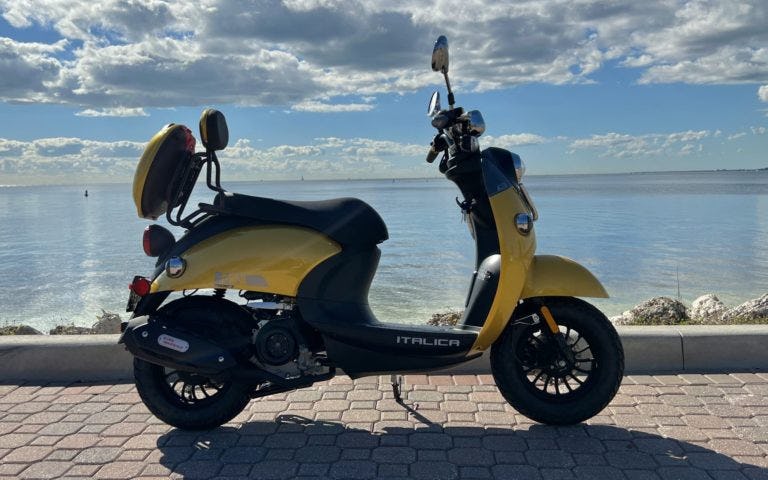 rent-a-italia-mini-50cc-yellow-motorcycle
