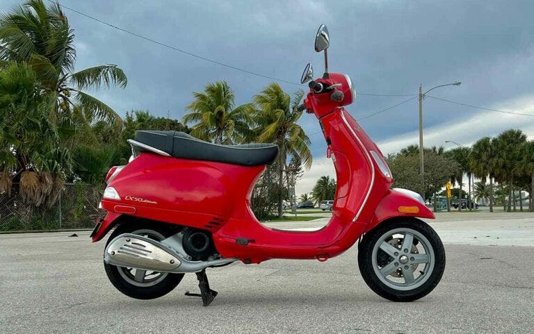 rent-a-vespa-lx-50-motorcycle-red